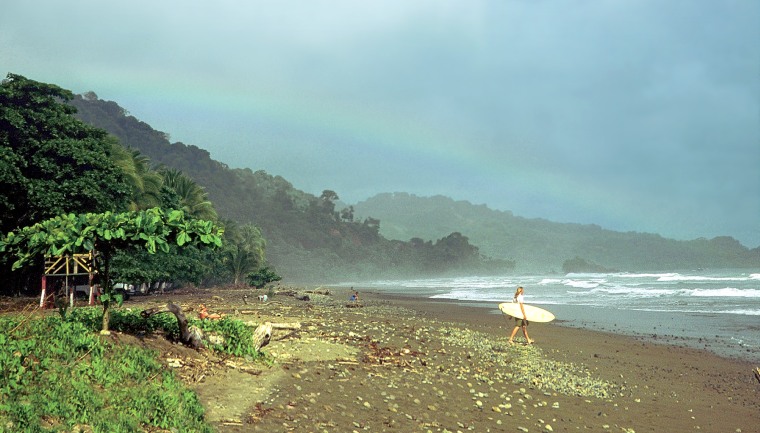 In Dominical, Costa Rica, the breaks attract surfers, and the setting—rain-forest-covered mountains, the Río Barú, long stretches of beach—attracts everyone else.